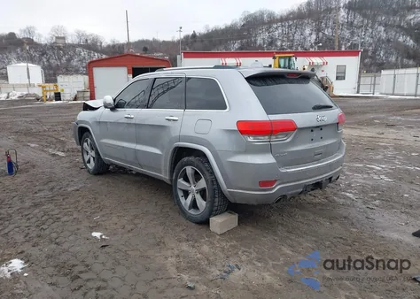 2014 Jeep Grand Cherokee Overland z USA, uszkodzony, nr VIN 1C4RJFCG6EC402398